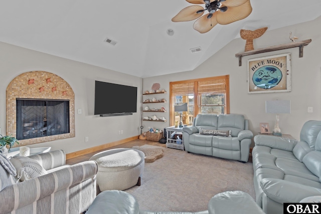 living room with lofted ceiling, baseboards, light carpet, and visible vents