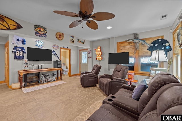 tiled living room with recessed lighting, visible vents, ceiling fan, and baseboards