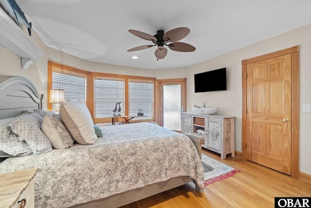 bedroom with recessed lighting, ceiling fan, light wood-style flooring, and baseboards