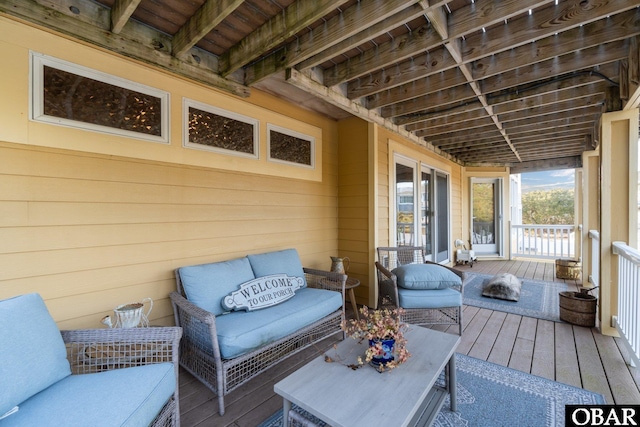 deck featuring outdoor lounge area