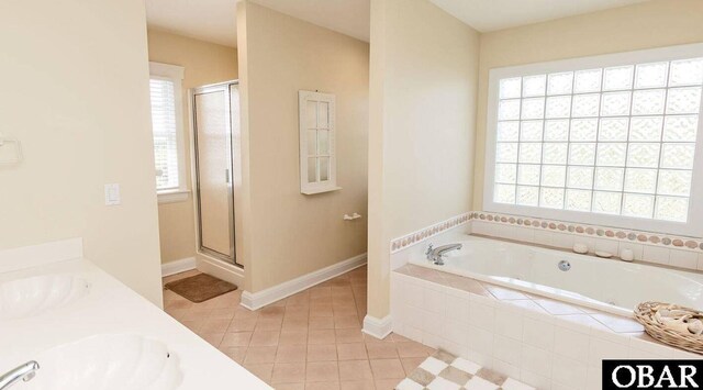 273 Whites Pt Lot 183, Corolla, NC 27927 - bathroom featuring healthy amount of natural light, tile patterned floors, a garden tub, and a stall shower