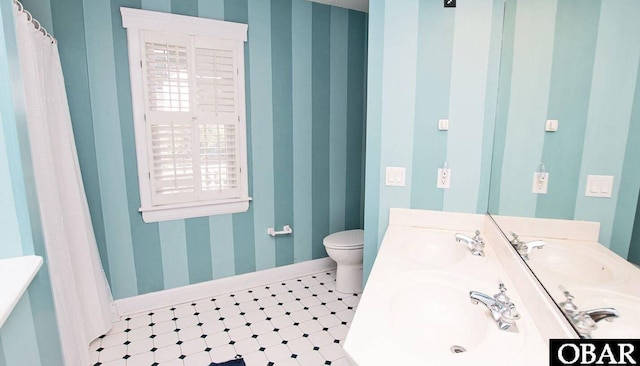273 Whites Pt Lot 183, Corolla, NC 27927 - bathroom with wallpapered walls, double vanity, and tile patterned floors
