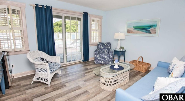 273 Whites Pt Lot 183, Corolla, NC 27927 - living room featuring healthy amount of natural light and wood finished floors