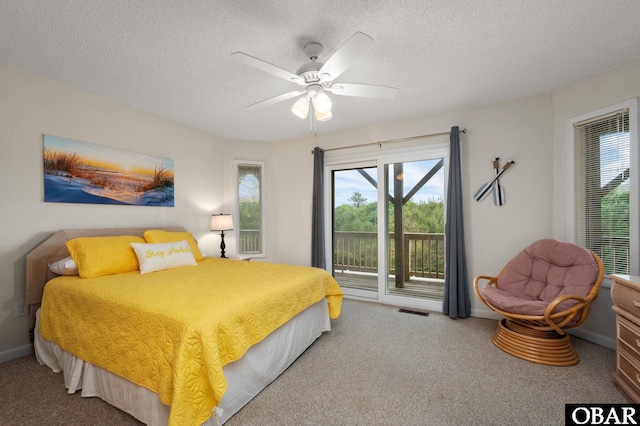 1045 Whalehead Dr Lot 27, Corolla, NC 27927 - bedroom with access to outside, carpet floors, a textured ceiling, ceiling fan, and baseboards