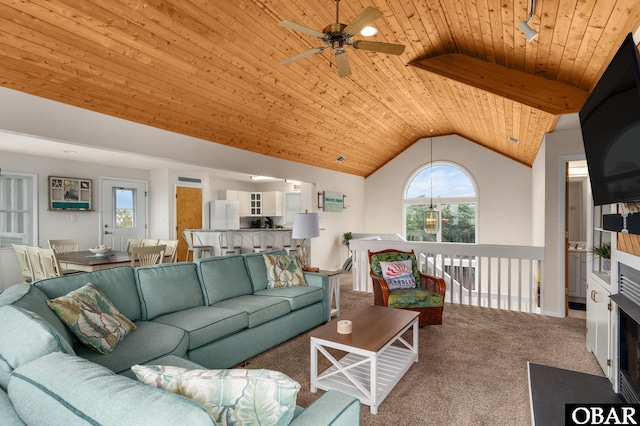 1045 Whalehead Dr Lot 27, Corolla, NC 27927 - living room with wood ceiling, a ceiling fan, plenty of natural light, lofted ceiling, and carpet