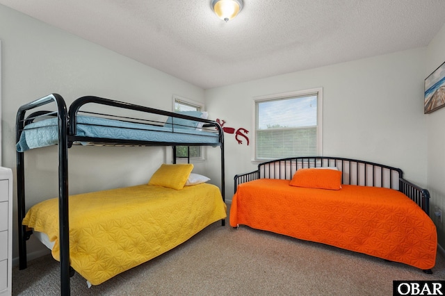 1045 Whalehead Dr Lot 27, Corolla, NC 27927 - bedroom with carpet floors and a textured ceiling