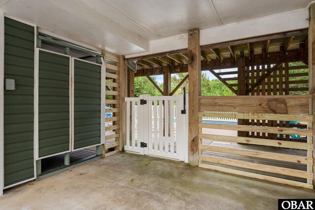 1045 Whalehead Dr Lot 27, Corolla, NC 27927 - view of patio featuring an exterior structure and an outdoor structure
