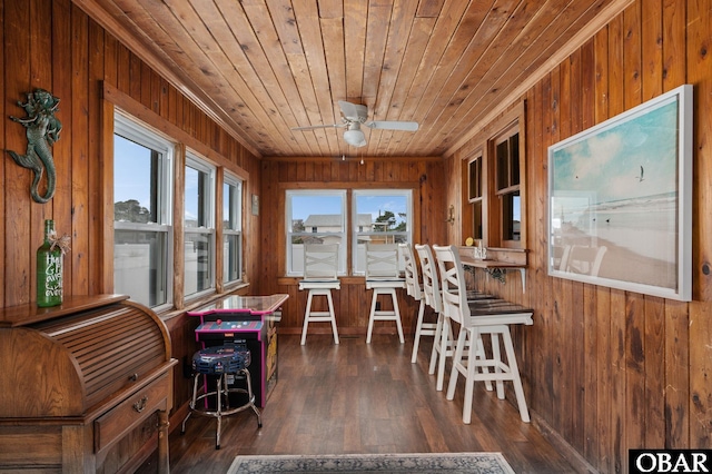 300 S Virginia Dare Trl Lot 1, Kill Devil Hills, NC 27948 - dining room featuring wood walls, healthy amount of natural light, wood ceiling, wood finished floors, and a ceiling fan
