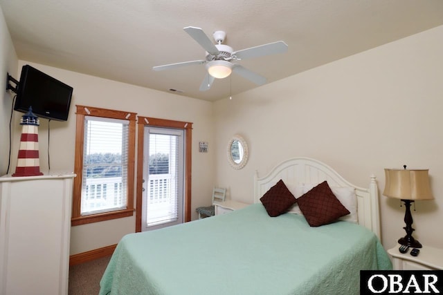 107 W Gray Eagle St Unit 112A, Nags Head, NC 27959 - bedroom featuring baseboards, ceiling fan, and carpet floors