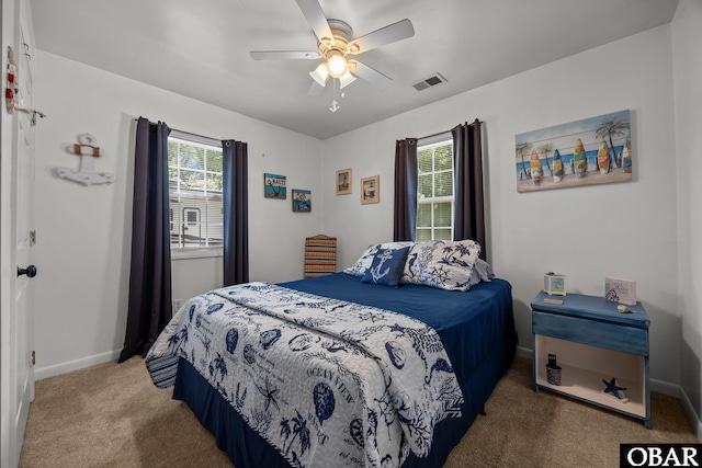 103 Nathan Dr Lot # 2, Grandy, NC 27939 - carpeted bedroom featuring baseboards and a ceiling fan
