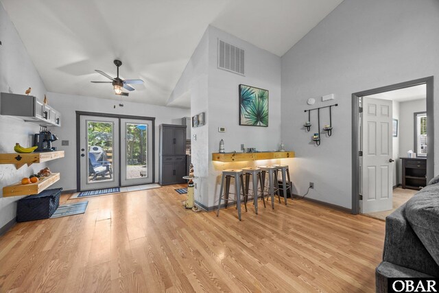 103 Nathan Dr Lot # 2, Grandy, NC 27939 - living room featuring light wood-type flooring, a ceiling fan, and high vaulted ceiling