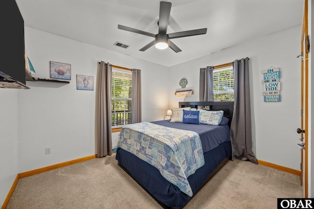 103 Nathan Dr Lot # 2, Grandy, NC 27939 - bedroom featuring carpet flooring, multiple windows, and a ceiling fan