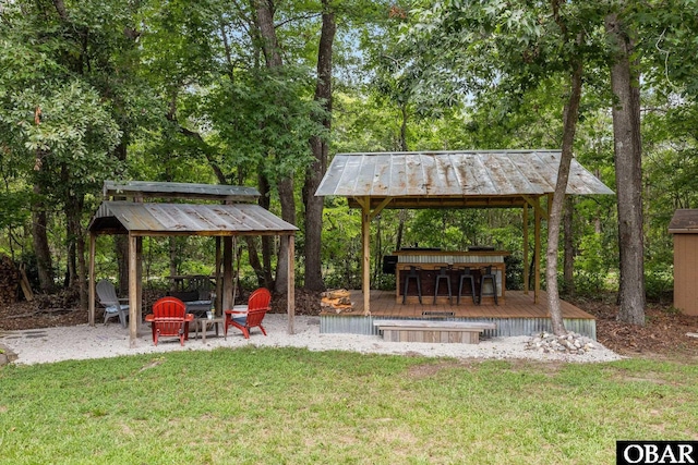 103 Nathan Dr Lot # 2, Grandy, NC 27939 - view of green lawn featuring a gazebo, a deck, and view of scattered trees