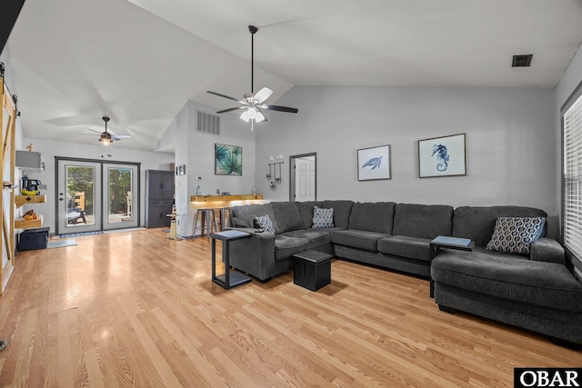 103 Nathan Dr Lot # 2, Grandy, NC 27939 - living room with ceiling fan, light wood-style floors, and high vaulted ceiling