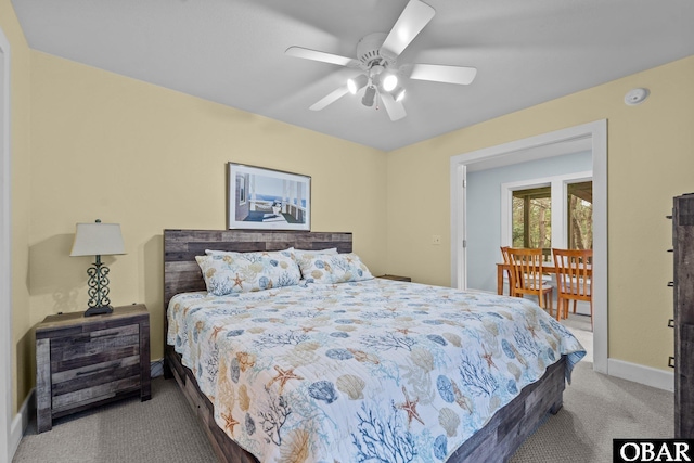 carpeted bedroom with baseboards and ceiling fan