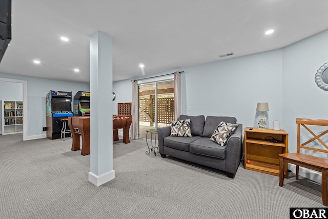 carpeted living room with recessed lighting, visible vents, and baseboards