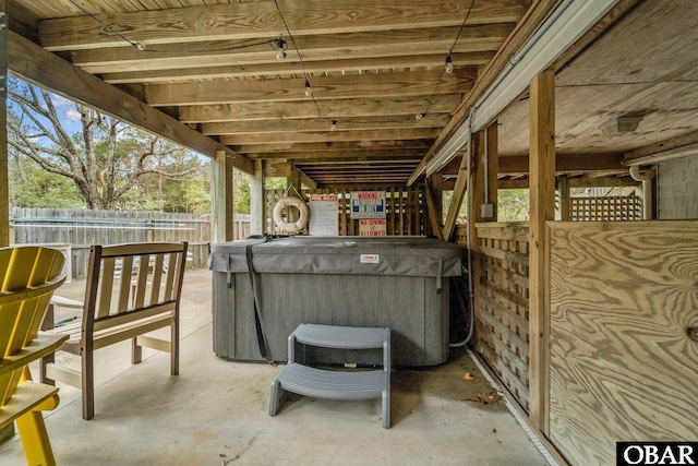 view of patio / terrace featuring a hot tub