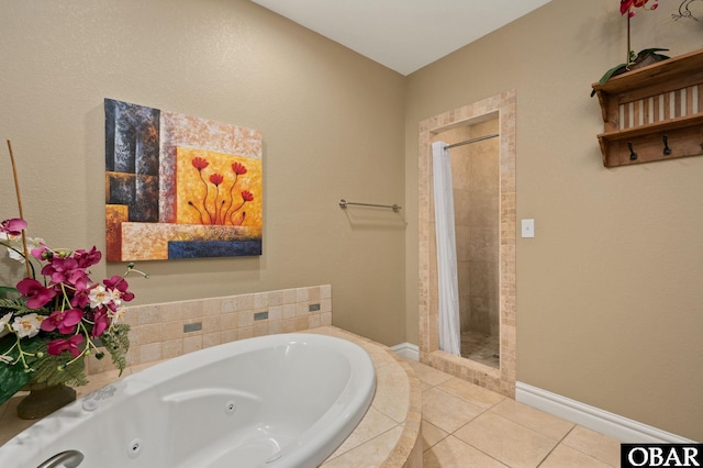 full bath with a stall shower, a whirlpool tub, tile patterned floors, and baseboards