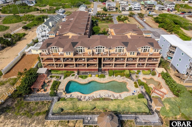 aerial view of residential area with a pool area