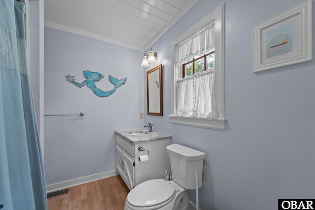 56 Ginguite Trl Lot 9, Southern Shores, NC 27949 - bathroom featuring vanity, toilet, wood finished floors, and baseboards