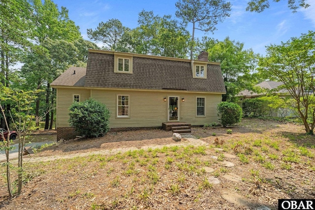 56 Ginguite Trl Lot 9, Southern Shores, NC 27949 - dutch colonial featuring roof with shingles and a chimney