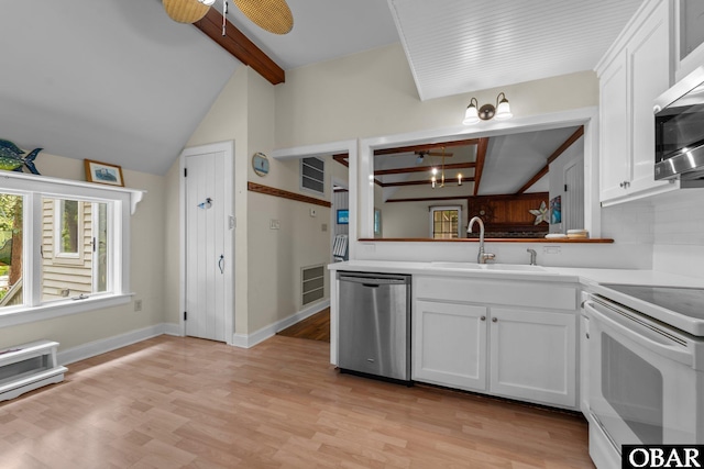 56 Ginguite Trl Lot 9, Southern Shores, NC 27949 - kitchen featuring stainless steel appliances, a sink, white cabinets, a ceiling fan, and light wood finished floors