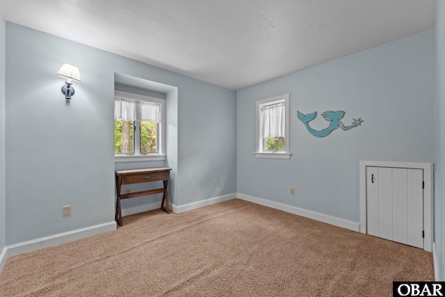 56 Ginguite Trl Lot 9, Southern Shores, NC 27949 - spare room with carpet and baseboards