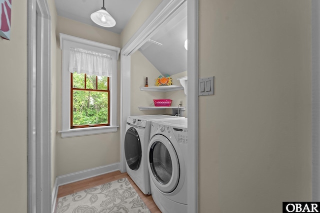 56 Ginguite Trl Lot 9, Southern Shores, NC 27949 - laundry room featuring independent washer and dryer, light wood-style flooring, and baseboards