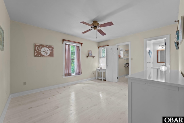 56 Ginguite Trl Lot 9, Southern Shores, NC 27949 - spare room with a ceiling fan, light wood-type flooring, and baseboards