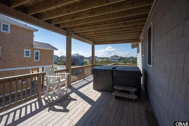 deck with a hot tub