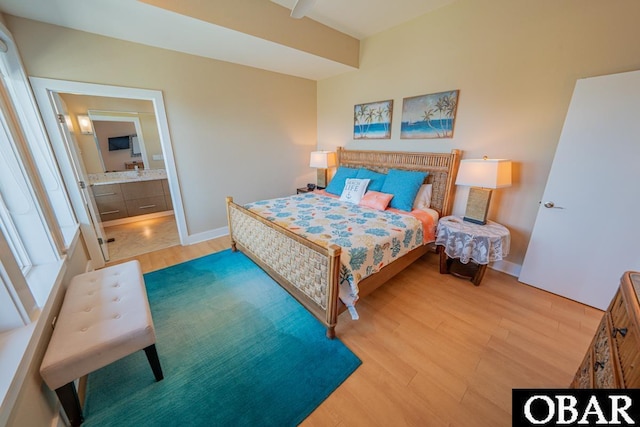57233 Summerplace Dr Lot 26, Hatteras, NC 27943 - bedroom featuring light wood finished floors and ensuite bathroom
