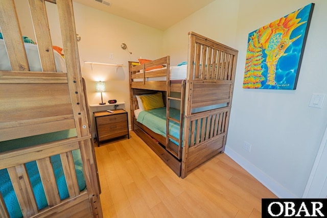 57233 Summerplace Dr Lot 26, Hatteras, NC 27943 - bedroom featuring wood finished floors