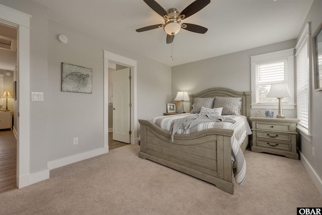 bedroom featuring a ceiling fan, baseboards, and carpet floors