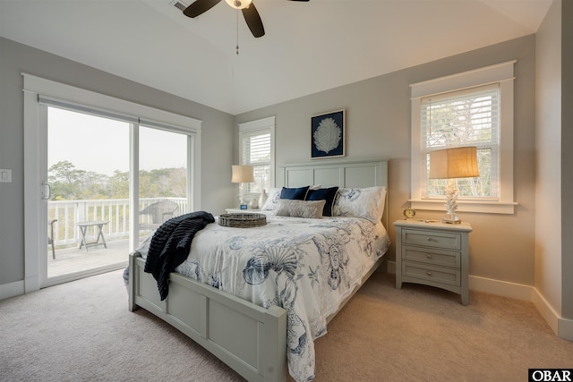 bedroom featuring access to exterior, baseboards, light colored carpet, lofted ceiling, and a ceiling fan