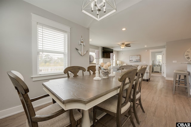 dining room with recessed lighting, light wood-type flooring, and baseboards