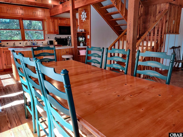 1218 Coral Ln Lot 4, Corolla, NC 27927 - dining area featuring stairway and light wood finished floors