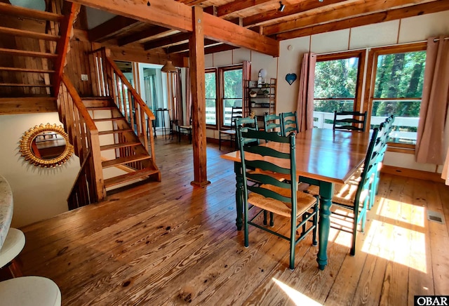 1218 Coral Ln Lot 4, Corolla, NC 27927 - dining room featuring wood-type flooring, stairs, and beam ceiling