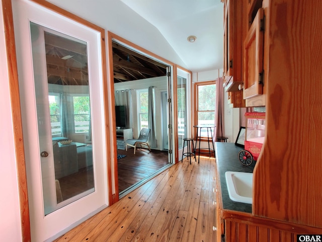 1218 Coral Ln Lot 4, Corolla, NC 27927 - interior space with light wood-style flooring and lofted ceiling