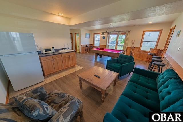 game room with recessed lighting, wainscoting, billiards, light wood finished floors, and a sink