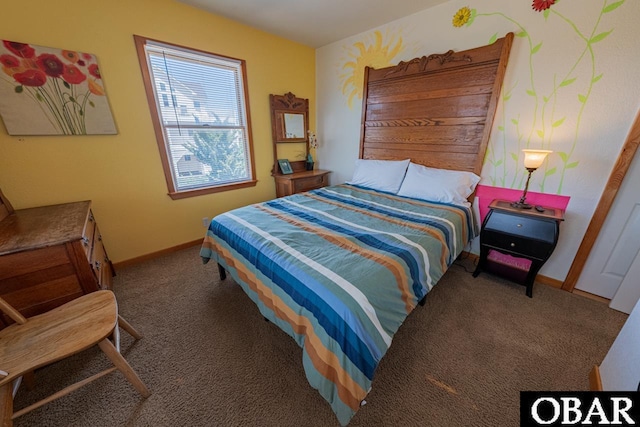 carpeted bedroom featuring baseboards