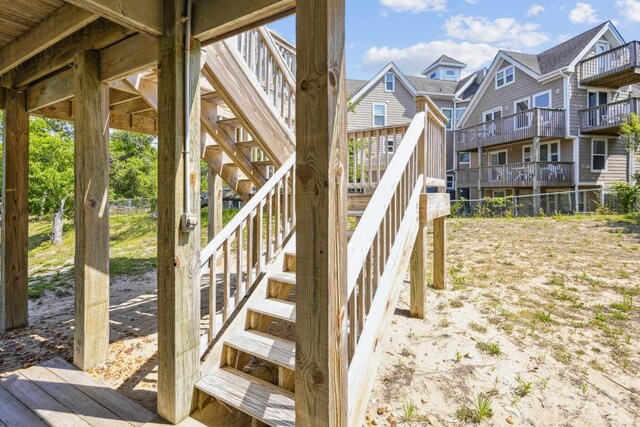 exterior space featuring stairway and a residential view