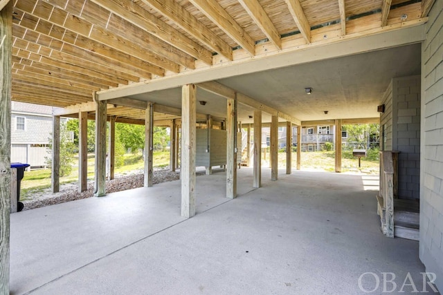 view of patio / terrace featuring a carport