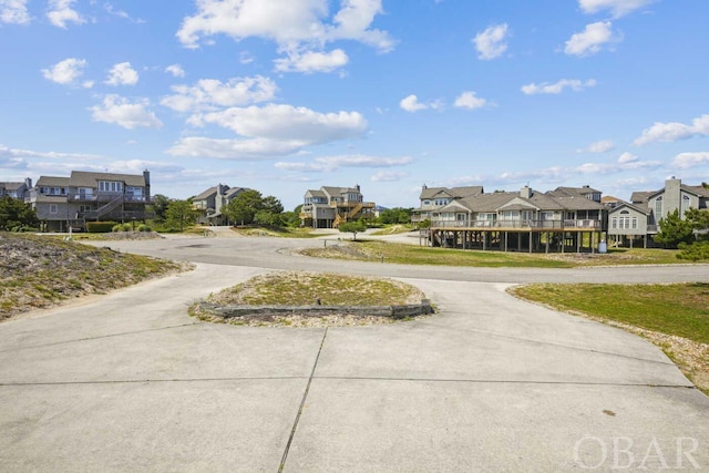 view of road with a residential view