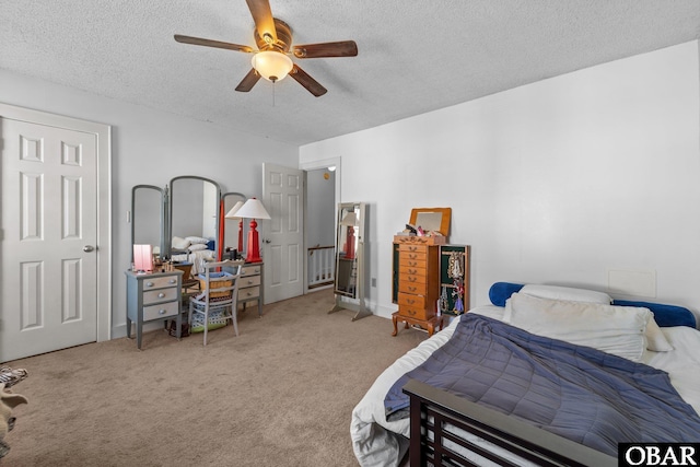 33 Croatan Ct Unit 33, Manteo, NC 27954 - bedroom with ceiling fan, carpet, and a textured ceiling
