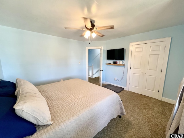 bedroom featuring carpet flooring, baseboards, ceiling fan, and a closet