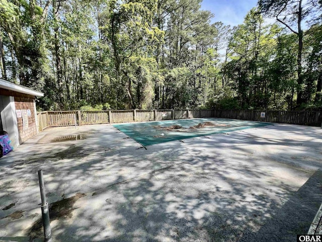exterior space featuring fence and a patio area
