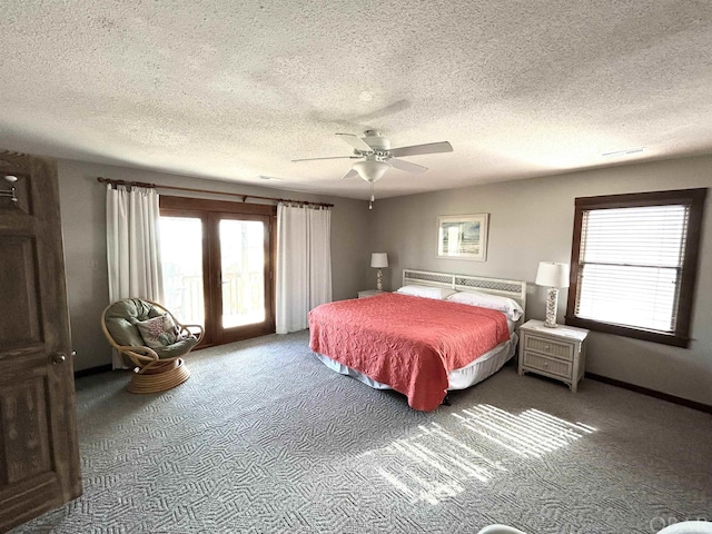 bedroom with visible vents, baseboards, a ceiling fan, access to outside, and carpet