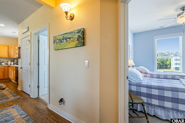 1800 Saint David Rd Unit 104-D 2, Kill Devil Hills, NC 27948 - hall with dark wood-style flooring and baseboards