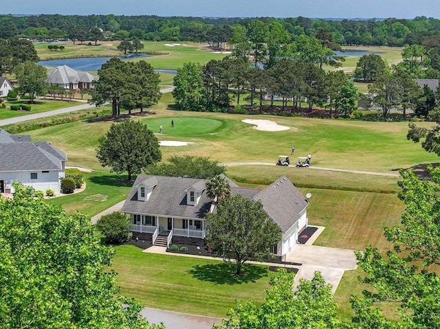 bird's eye view with view of golf course