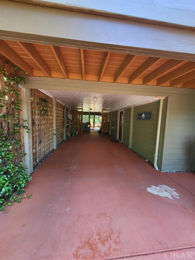 view of patio / terrace with an attached carport